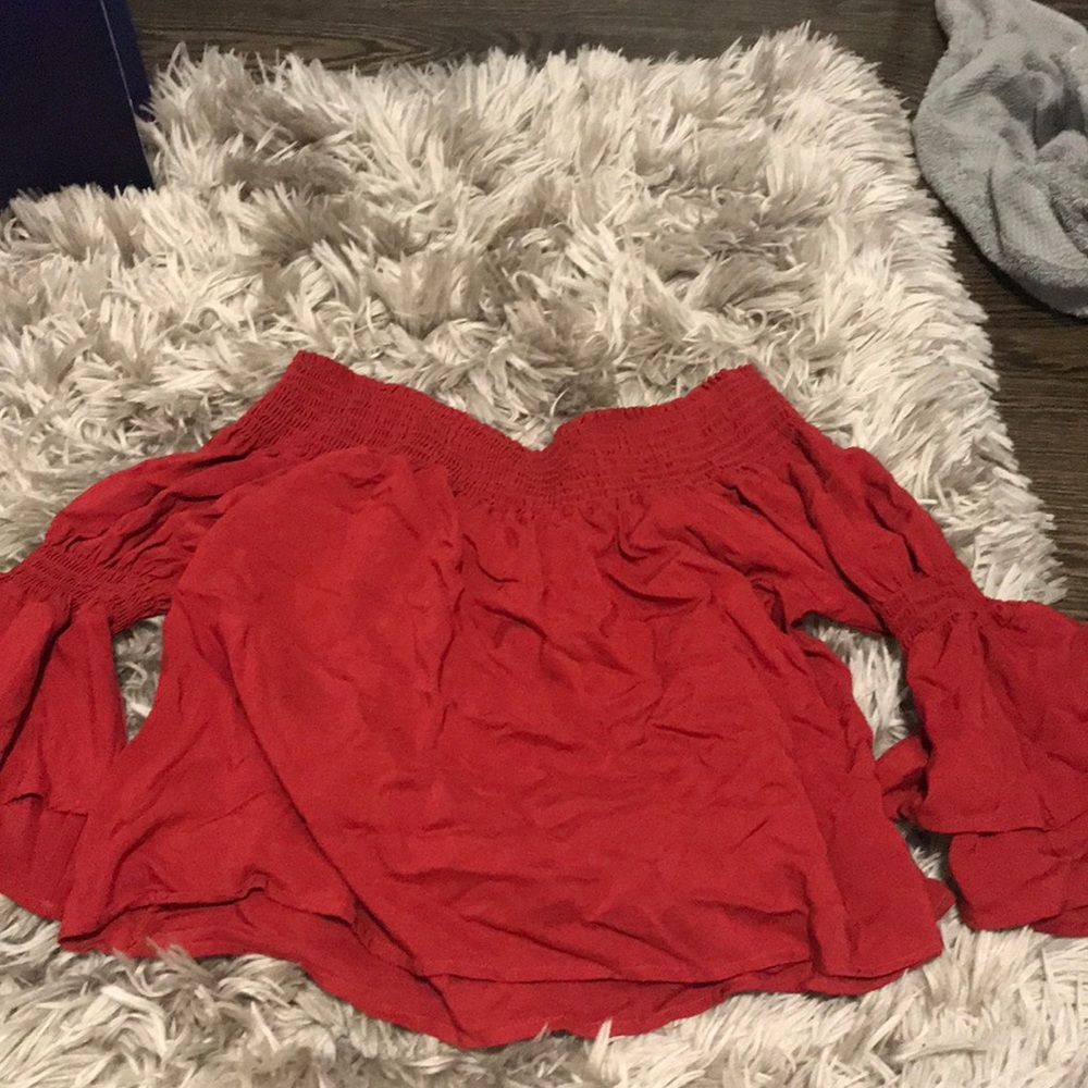 Dark orange-red off the shoulder blouse